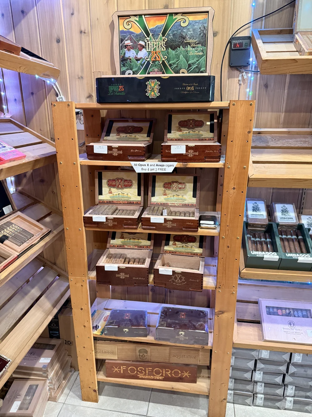Arturo Fuente Opus X cigars on display in the Match Cigar Bar walk-in humidor, premium Dominican cigars arranged in cedar shelving