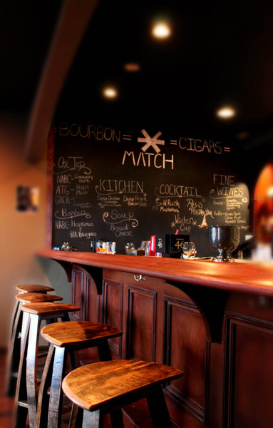 Match Cigar Bar lounge interior with premium cigar selection including RoMa Craft Tobac
