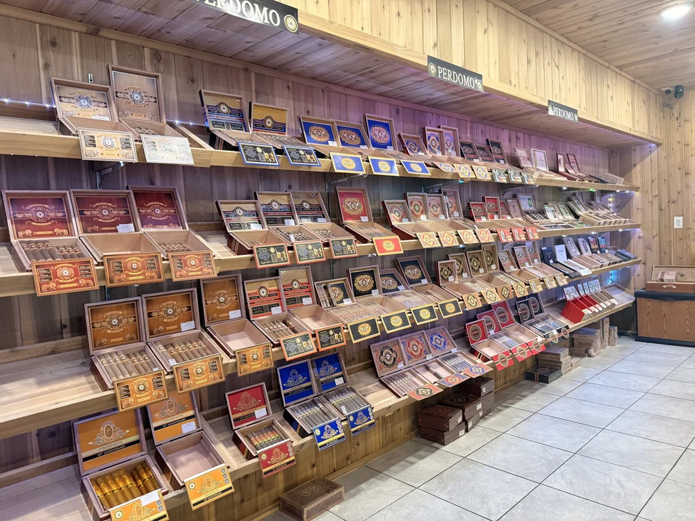 Perdomo Cigars wall display inside the walk-in humidor at Match Cigar Bar, featuring one of the largest Perdomo selections in the Jeffersonville and Louisville area